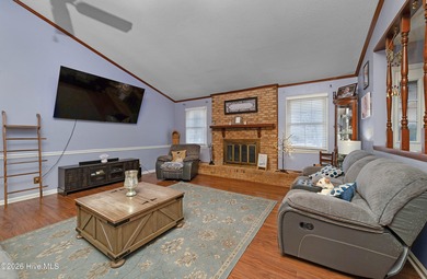 Tucked away on a wooded lot in Fairfield Harbour, this inviting on Harbour Point Golf Club in North Carolina - for sale on GolfHomes.com, golf home, golf lot