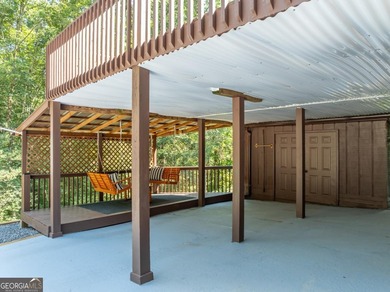 Come home to this impeccably maintained 3 BR/3 BA mountain cabin on White Path Golf Club in Georgia - for sale on GolfHomes.com, golf home, golf lot