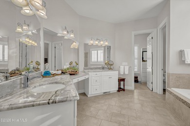 Welcome to 8948 Woodcreek Circle - where this 2006 built home on Porters Neck Country Club in North Carolina - for sale on GolfHomes.com, golf home, golf lot