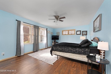 Tucked away on a wooded lot in Fairfield Harbour, this inviting on Harbour Point Golf Club in North Carolina - for sale on GolfHomes.com, golf home, golf lot