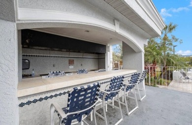 Welcome to Crystal Bay in Feather Sound --a resort-style on Feather Sound Country Club in Florida - for sale on GolfHomes.com, golf home, golf lot