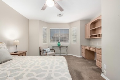 Discover the charm of this inviting 2-bedroom townhome in the on Fountain of the Sun Country Club in Arizona - for sale on GolfHomes.com, golf home, golf lot