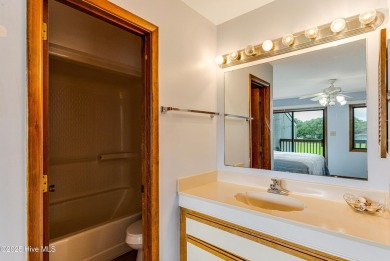Discover the perfect blend of coastal charm and resort-style on Oak Island Golf Club in North Carolina - for sale on GolfHomes.com, golf home, golf lot