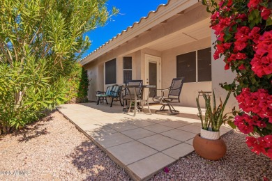 Discover the charm of this inviting 2-bedroom townhome in the on Fountain of the Sun Country Club in Arizona - for sale on GolfHomes.com, golf home, golf lot