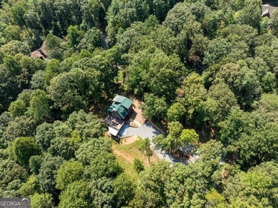 Come home to this impeccably maintained 3 BR/3 BA mountain cabin on White Path Golf Club in Georgia - for sale on GolfHomes.com, golf home, golf lot