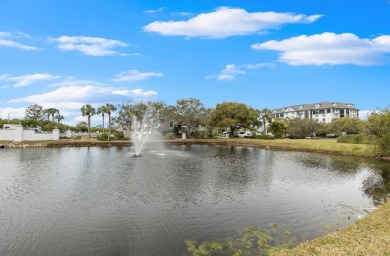 Welcome to Crystal Bay in Feather Sound --a resort-style on Feather Sound Country Club in Florida - for sale on GolfHomes.com, golf home, golf lot