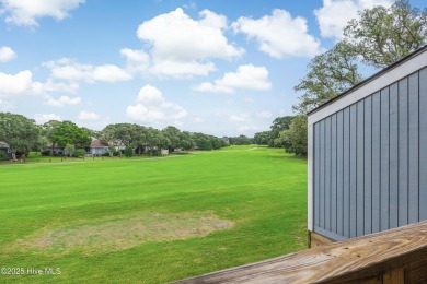 Discover the perfect blend of coastal charm and resort-style on Oak Island Golf Club in North Carolina - for sale on GolfHomes.com, golf home, golf lot