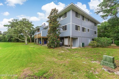Discover the perfect blend of coastal charm and resort-style on Oak Island Golf Club in North Carolina - for sale on GolfHomes.com, golf home, golf lot
