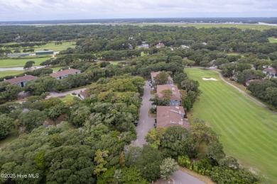 Discover the perfect blend of coastal charm and resort-style on Oak Island Golf Club in North Carolina - for sale on GolfHomes.com, golf home, golf lot