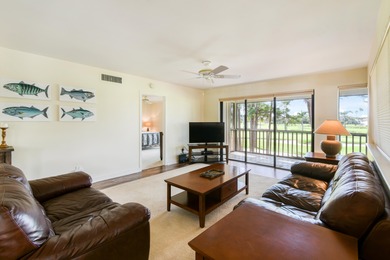 Experience resort-style living with this exceptional condo on PGA National Golf Club in Florida - for sale on GolfHomes.com, golf home, golf lot