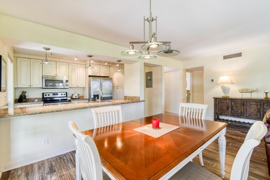 Experience resort-style living with this exceptional condo on PGA National Golf Club in Florida - for sale on GolfHomes.com, golf home, golf lot