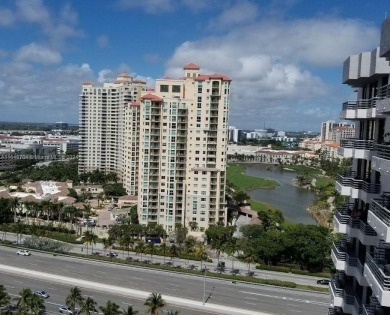 CHARMING HIGH-FLOOR UNIT WITH SPECTACULAR UNOBSTRUCTED VIEWS OF on  in Florida - for sale on GolfHomes.com, golf home, golf lot