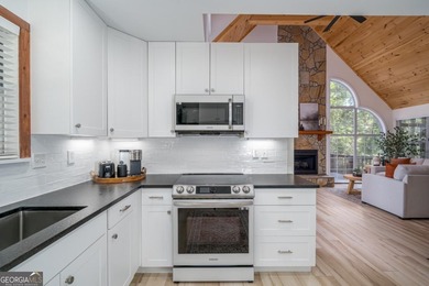 Come home to this impeccably maintained 3 BR/3 BA mountain cabin on White Path Golf Club in Georgia - for sale on GolfHomes.com, golf home, golf lot