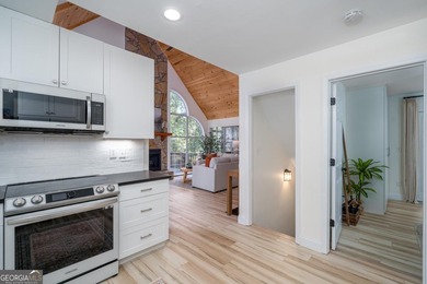 Come home to this impeccably maintained 3 BR/3 BA mountain cabin on White Path Golf Club in Georgia - for sale on GolfHomes.com, golf home, golf lot