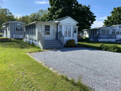 This well kept camp that resides within the Apple Island Resort on Apple Island Golf Course At Apple Island Resort in Vermont - for sale on GolfHomes.com, golf home, golf lot