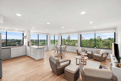 Sunlit Corner Unit with sweeping Golf Course Views in a highly on  in Florida - for sale on GolfHomes.com, golf home, golf lot