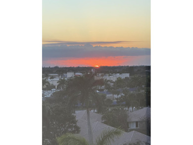 Sunlit Corner Unit with sweeping Golf Course Views in a highly on  in Florida - for sale on GolfHomes.com, golf home, golf lot