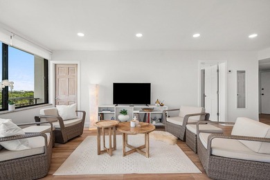 Sunlit Corner Unit with sweeping Golf Course Views in a highly on  in Florida - for sale on GolfHomes.com, golf home, golf lot