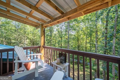 Come home to this impeccably maintained 3 BR/3 BA mountain cabin on White Path Golf Club in Georgia - for sale on GolfHomes.com, golf home, golf lot