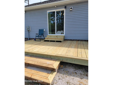 Custom home on huge lot with NO HOA and water view of Paradise on The Lakes Country Club in North Carolina - for sale on GolfHomes.com, golf home, golf lot