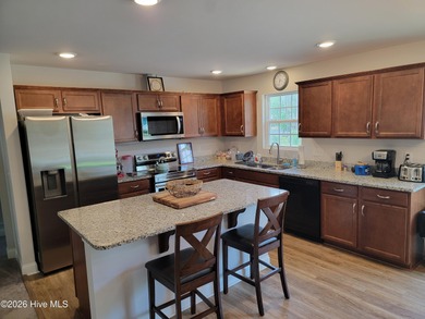 Custom home on huge lot with NO HOA and water view of Paradise on The Lakes Country Club in North Carolina - for sale on GolfHomes.com, golf home, golf lot