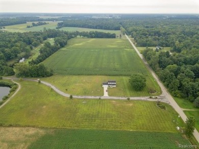 Vacant land in the prestigious Timber Point Estates ready for on The Timbers Golf Club in Michigan - for sale on GolfHomes.com, golf home, golf lot