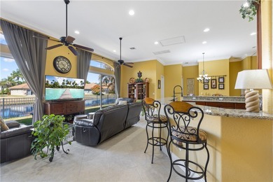 Meticulously landscaped courtyard entry, sculpted gardens and on Bent Pine Golf Club in Florida - for sale on GolfHomes.com, golf home, golf lot