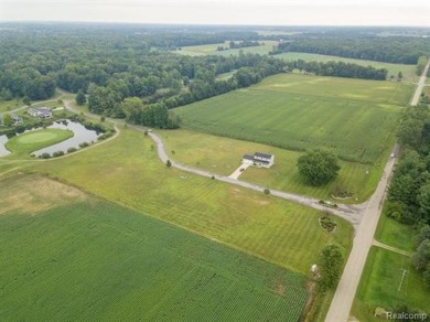 Vacant land in the prestigious Timber Point Estates ready for on The Timbers Golf Club in Michigan - for sale on GolfHomes.com, golf home, golf lot