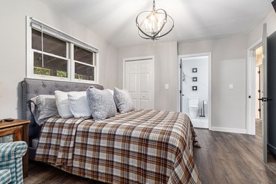 Discover the perfect blend of modern updates and mountain living on Bent Tree Golf Course in Georgia - for sale on GolfHomes.com, golf home, golf lot