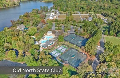 Embrace lake life at its finest in this truly exceptional on Old North State Club at Uwharrie Point Golf community in North Carolina - for sale on GolfHomes.com, golf home, golf lot