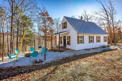 Such an adorable retreat with 2 Cozy Cottages, RV Pad w/50 Amp on  in Arkansas - for sale on GolfHomes.com, golf home, golf lot