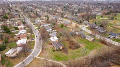 This charming split-level home features three-cozy bedrooms and on Mt. Prospect Golf Club in Illinois - for sale on GolfHomes.com, golf home, golf lot