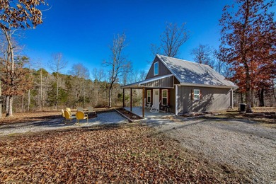 Such an adorable retreat with 2 Cozy Cottages, RV Pad w/50 Amp on  in Arkansas - for sale on GolfHomes.com, golf home, golf lot