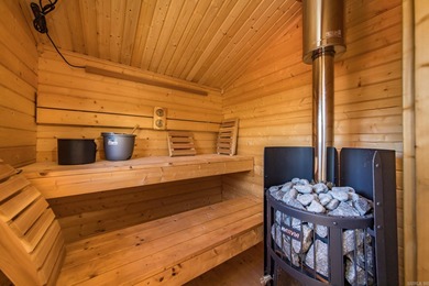 Such an adorable retreat with 2 Cozy Cottages, RV Pad w/50 Amp on  in Arkansas - for sale on GolfHomes.com, golf home, golf lot