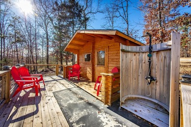 Such an adorable retreat with 2 Cozy Cottages, RV Pad w/50 Amp on  in Arkansas - for sale on GolfHomes.com, golf home, golf lot