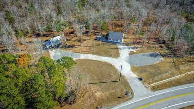 Such an adorable retreat with 2 Cozy Cottages, RV Pad w/50 Amp on  in Arkansas - for sale on GolfHomes.com, golf home, golf lot