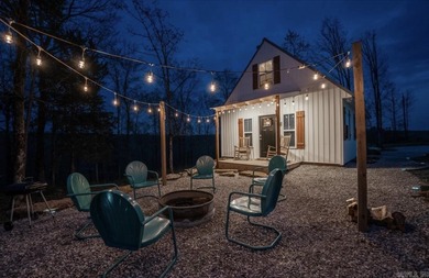 Such an adorable retreat with 2 Cozy Cottages, RV Pad w/50 Amp on  in Arkansas - for sale on GolfHomes.com, golf home, golf lot