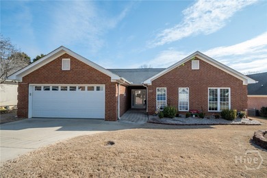 Enjoy low-maintenance living in a beautiful golf course setting on Jennings Mill Country Club in Georgia - for sale on GolfHomes.com, golf home, golf lot