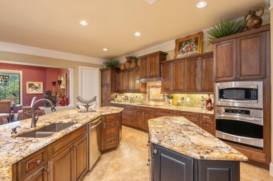 Welcome to a beautiful custom-built one level home in the on Kelly Plantation Golf Club in Florida - for sale on GolfHomes.com, golf home, golf lot