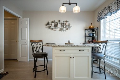 Enjoy low-maintenance living in a beautiful golf course setting on Jennings Mill Country Club in Georgia - for sale on GolfHomes.com, golf home, golf lot