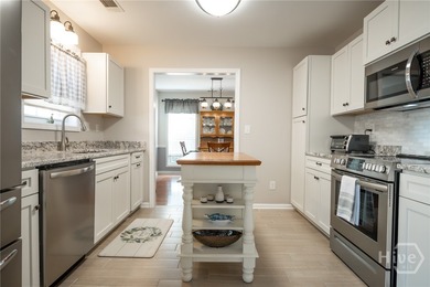 Enjoy low-maintenance living in a beautiful golf course setting on Jennings Mill Country Club in Georgia - for sale on GolfHomes.com, golf home, golf lot