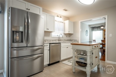 Enjoy low-maintenance living in a beautiful golf course setting on Jennings Mill Country Club in Georgia - for sale on GolfHomes.com, golf home, golf lot