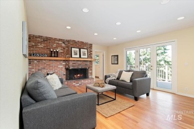 Discover luxury living in this stunning 6-bed, 4-bath home on Crane Creek Country Club in Idaho - for sale on GolfHomes.com, golf home, golf lot