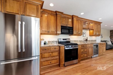 Discover luxury living in this stunning 6-bed, 4-bath home on Crane Creek Country Club in Idaho - for sale on GolfHomes.com, golf home, golf lot