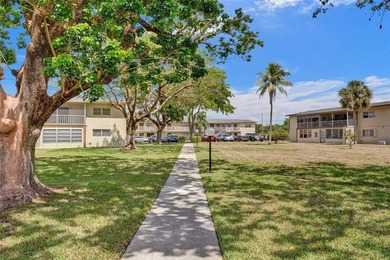 Opportunity Awaits In This 2-bedroom, 2-bath, HOPA Condo. Unit on  in Florida - for sale on GolfHomes.com, golf home, golf lot