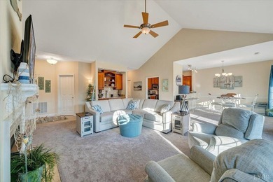 Enjoy effortless lake living in this top-floor 2-bedroom, 2-bath on The Waterfront Country Club in Virginia - for sale on GolfHomes.com, golf home, golf lot
