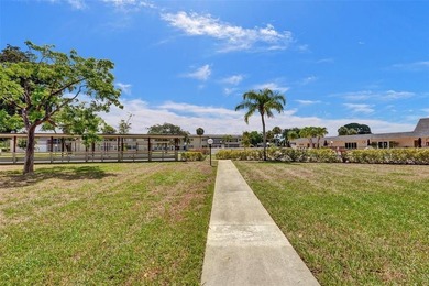 Opportunity Awaits In This 2-bedroom, 2-bath, HOPA Condo. Unit on  in Florida - for sale on GolfHomes.com, golf home, golf lot
