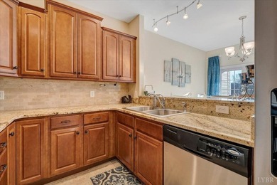 Enjoy effortless lake living in this top-floor 2-bedroom, 2-bath on The Waterfront Country Club in Virginia - for sale on GolfHomes.com, golf home, golf lot