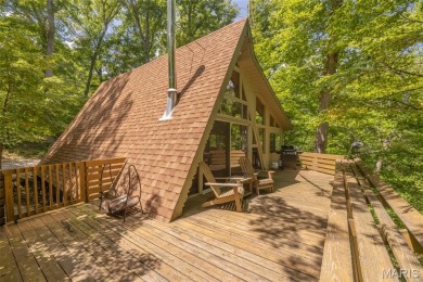 Close to the beach AND tucked away on 3.67 acres this adorable on Innsbrook Resort Golf Course in Missouri - for sale on GolfHomes.com, golf home, golf lot