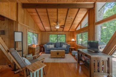 Close to the beach AND tucked away on 3.67 acres this adorable on Innsbrook Resort Golf Course in Missouri - for sale on GolfHomes.com, golf home, golf lot
